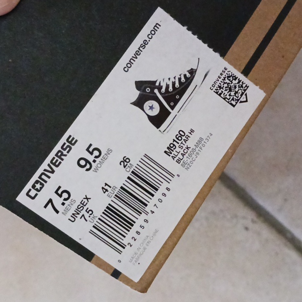 Converse high top shoes.